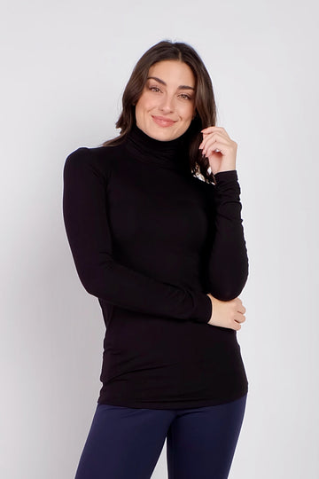 woman wearing black long sleeve turtle neck