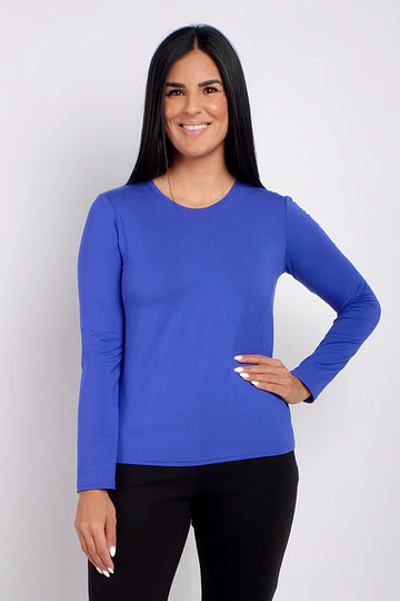Woman wearing long sleeve blue work top