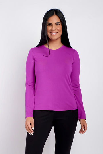 woman wearing long sleeve purple work top