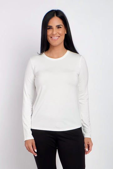 Woman wearing white long sleeve work top