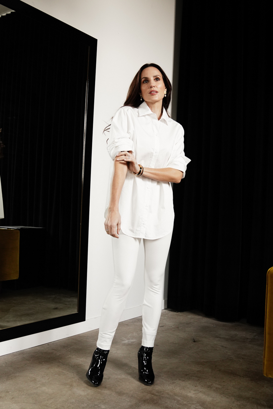 woman wearing all white work outfit