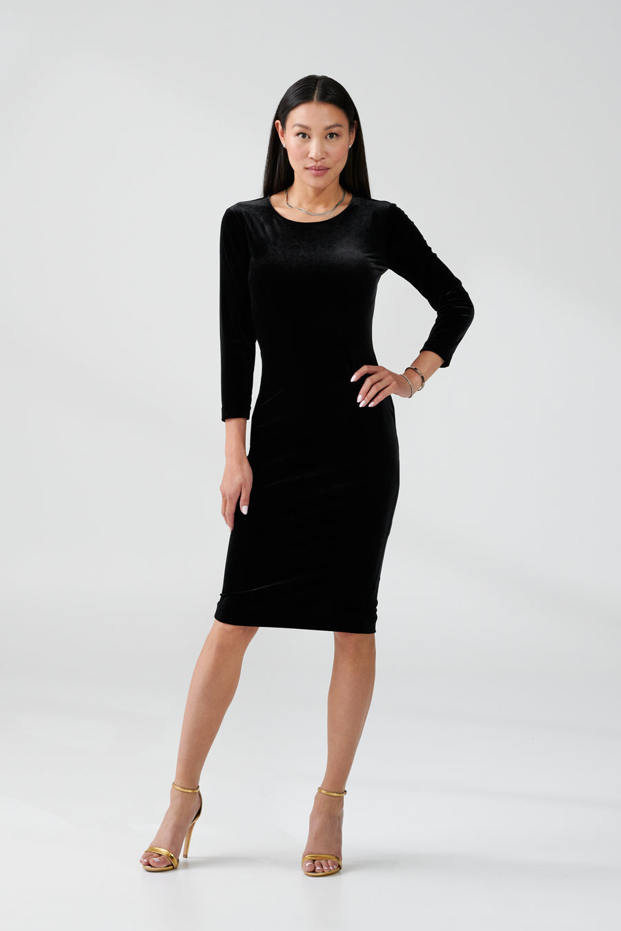 woman wearing long sleeve black dress