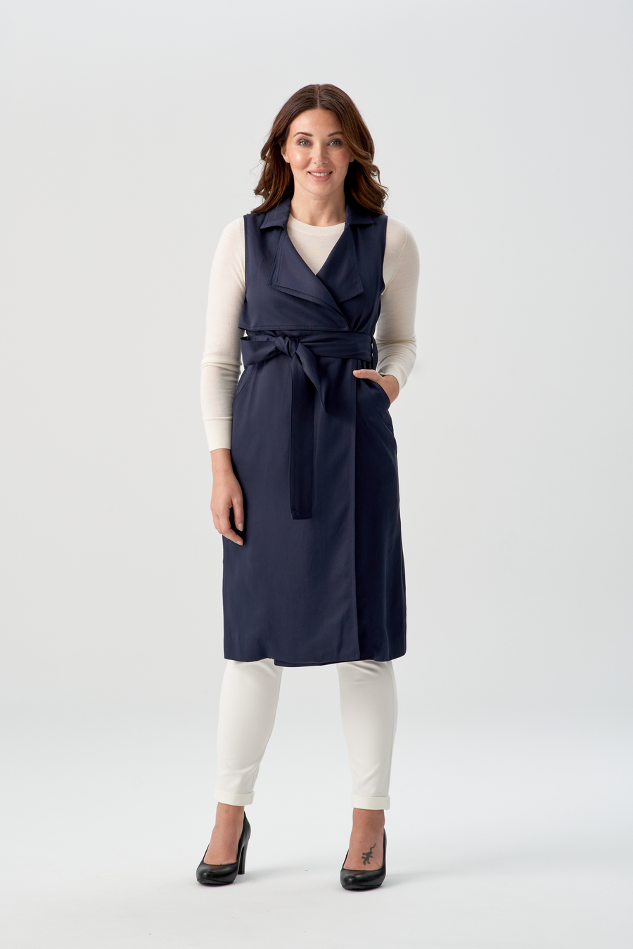 woman wearing navy blue vest
