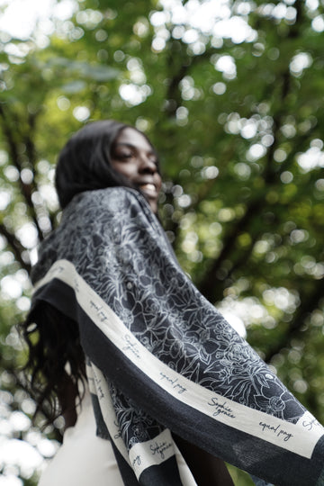 woman wearing white dress with scarf