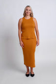 woman wearing casual work set in orange
