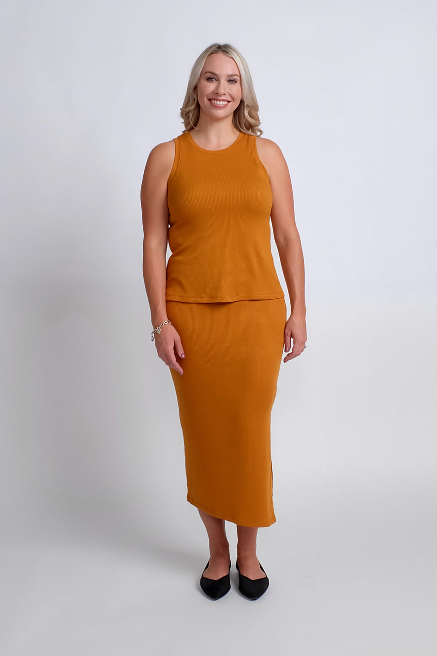 woman wearing casual work set in orange