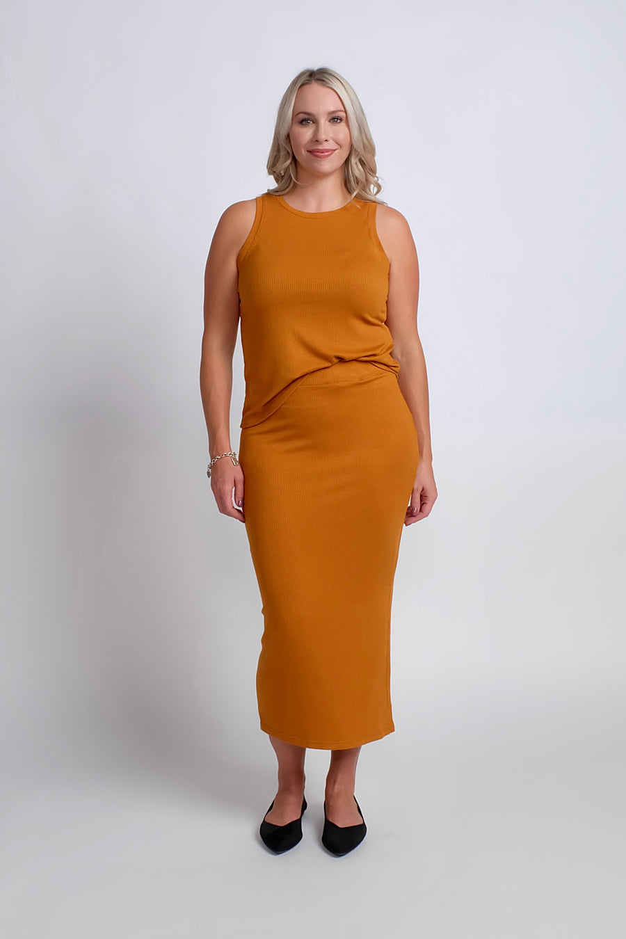 woman wearing casual work set in orange