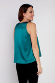 woman wearing silk turquoise sleeveless work top