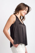 woman wearing black silk sleeveless work top
