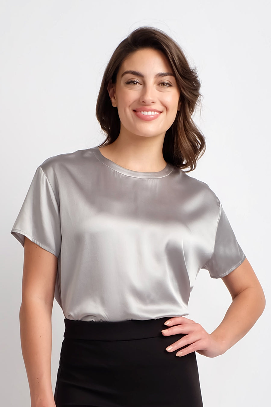 woman wearing short sleeve silver silk top