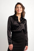 woman wearing long sleeve black silk button up top