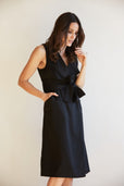 woman wearing black vest dress