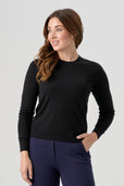 woman wearing black cardigan with navy blue pant