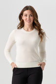 woman wearing white cardigan with black pants