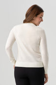 woman wearing white cardigan