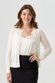 woman wearing white button up cardigan with black pencil skirt