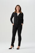 woman wearing black button up cardigan with black pant