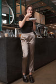 woman wearing black short sleeve with silk work pants