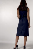 woman wearing navy blue workwear outfit