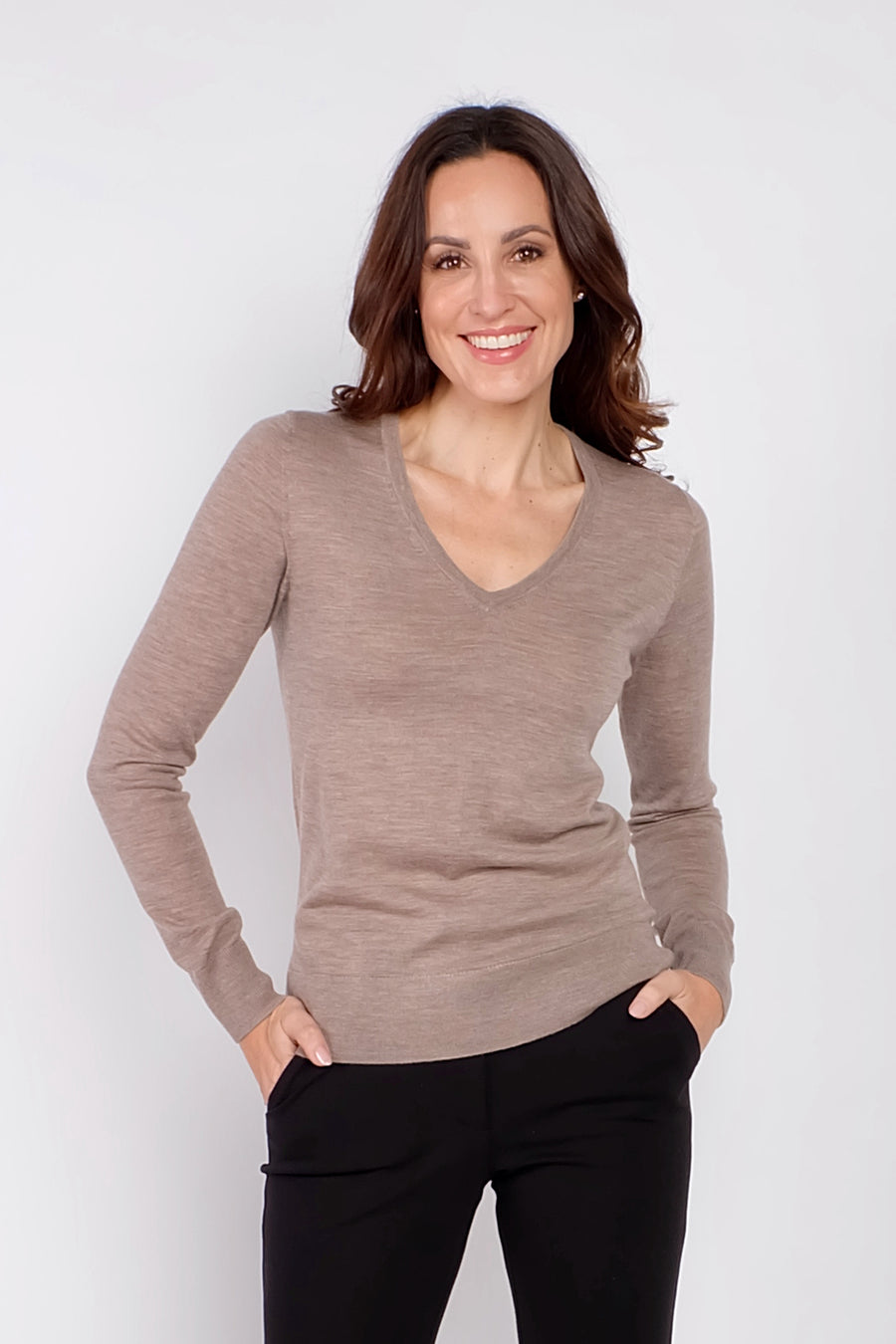 woman wearing brown long sleeve cashmere sweater