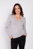 woman wearing grey long sleeve cashmere sweater