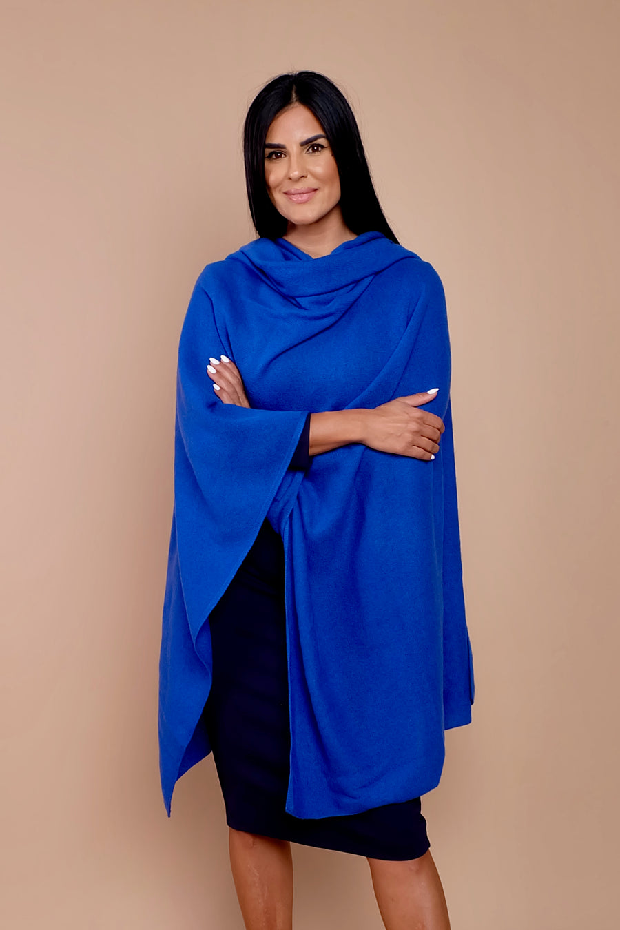 woman wearing black work dress with blue scarf